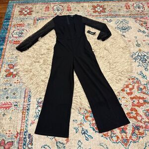NWT Bebe mesh v neck jumpsuit size small